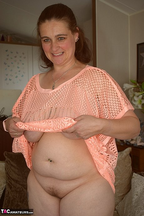 Redheaded BBW makes her naked modelling debut upon a sofa - Image 10 of 16  in Amateur category   featuring Cheeky Dee 