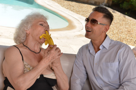 Grey haired grandmother Norma B licks a penis before taking it in her twat poolside - #47080