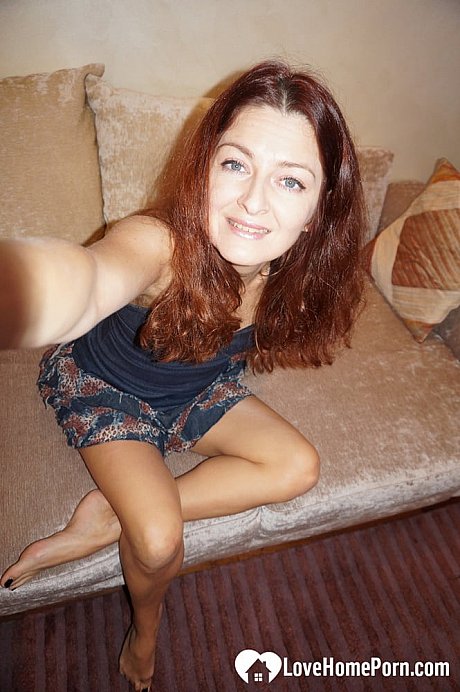 Slutty redheaded amateur MILF stripping and posing to take lovely selfies - Image 11 of 20  in Spreading category   featuring Helen Volga 