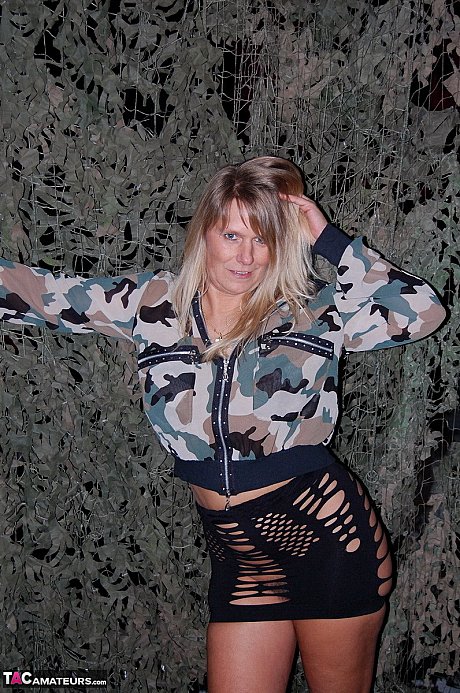 Older blonde attractive Susi exposes her boobies and twat in a camouflage jacket - Image 3 of 16  in Close Up category   featuring Sweet Susi 