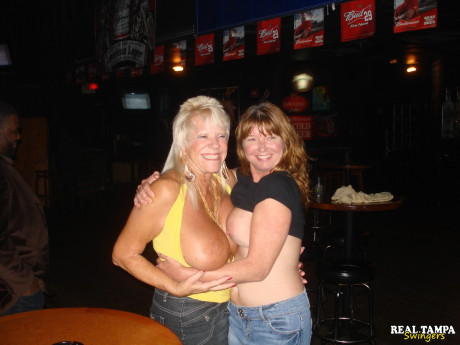 Blonde amateur cougar shows her shaved clam in the swinger night club - #1282939