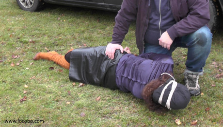 Brunette female is rendered unconscious before being loaded into a minivan - #1093941