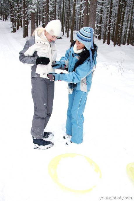 Babes with big boobs Yvonne A and Ora strip and play with a toy in the snow - #1425422