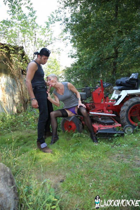 Short haired cougar fucks the young teenie farmer that has some to fix her ride - #77511