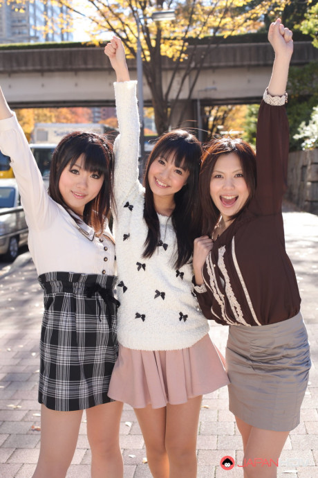 Three Japanese bitches in skirts pose outdoors for a SFW shoot - #1112271