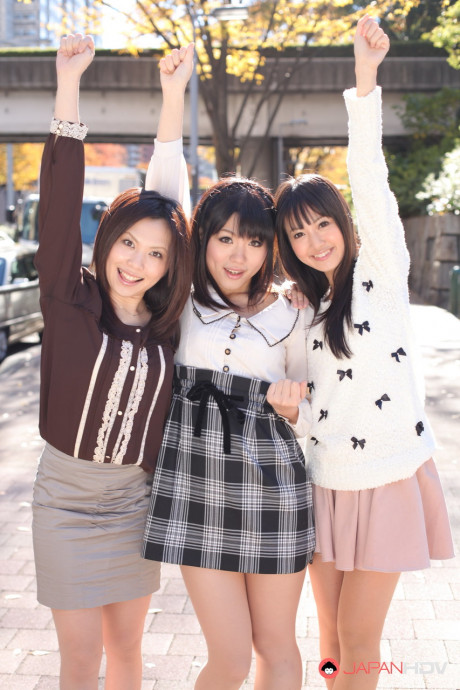 Three Japanese bitches in skirts pose outdoors for a SFW shoot - #1112273