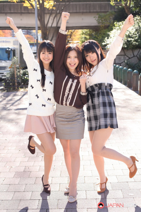 Three Japanese bitches in skirts pose outdoors for a SFW shoot - #1112274