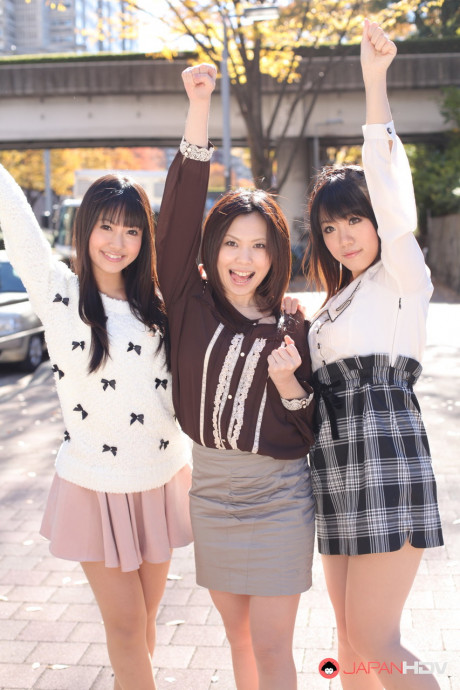 Three Japanese bitches in skirts pose outdoors for a SFW shoot - #1112276