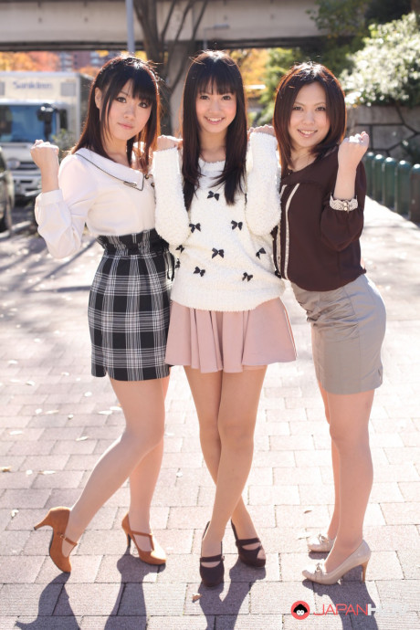 Three Japanese bitches in skirts pose outdoors for a SFW shoot - #1112277