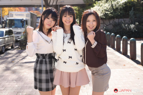 Three Japanese bitches in skirts pose outdoors for a SFW shoot - #1112278