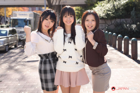 Three Japanese bitches in skirts pose outdoors for a SFW shoot - #1112279