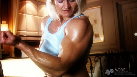 Mature bodybuilder Brigita Brezovac flaunts her muscles & squeezes her titties - #1072378