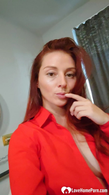 Beautiful redhead shows off her gigantic titties & her tattoos while taking nudes - #1349251