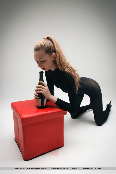 Fetish lady girl broad Areana Fox in crotchless catsuit stuffs a wine bottle in her vagina - #598548