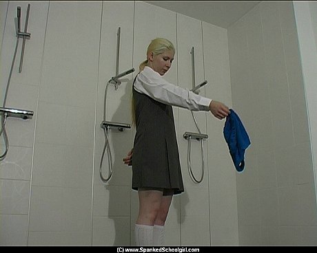 Blondy student is made to get naked before receiving a brutal caning - Image 2 of 16  in Pussy category  