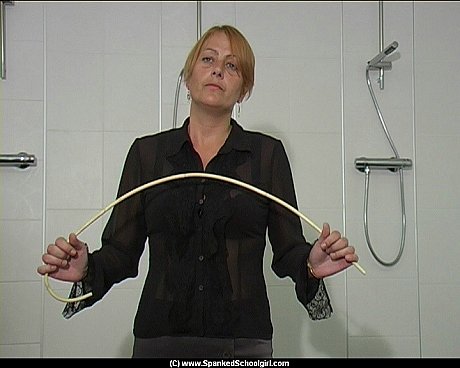 Blondy student is made to get naked before receiving a brutal caning - Image 9 of 16  in Pussy category  