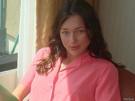 Raven-haired teenie strips on the balcony and shows her hot medium titties - Gallery #42789