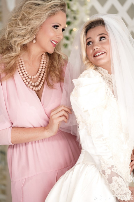 Carolina Sweets is affixed with a garter before a lesbian wedding to Julia Ann - #206092