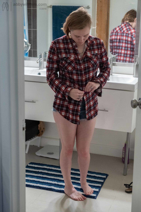 Sweet teen with small boobs Annika gets spied on while dressing in the toilet - #632170