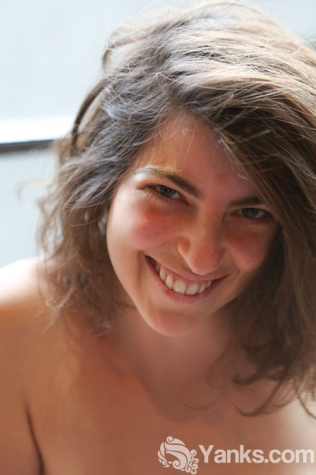 Enormous boobed amateur brunette Nora getting undressed and revealing her bushy beaver - #1136518