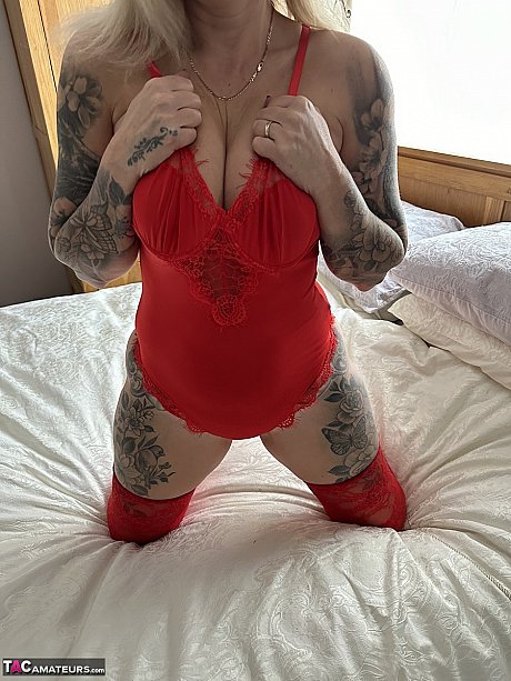 Tattooed blondy Inked MILF removes red undies and pantyhose to go undressed - Image 4 of 16  in Pussy category   featuring Inked MILF 