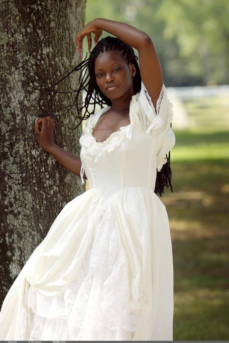 Ebony with amazing giant boobies Deserea doffs her dress and poses outdoors - #31907