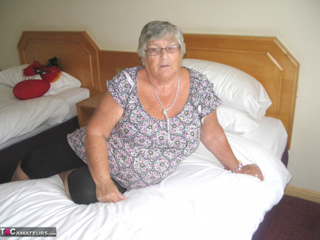 Silver haired British broad granny Libby exposes her meaty body on a bed - #911267