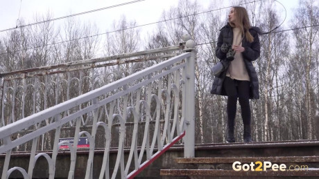 Caucasian female Valya takes a piss on snow-covered steps in public - #251144