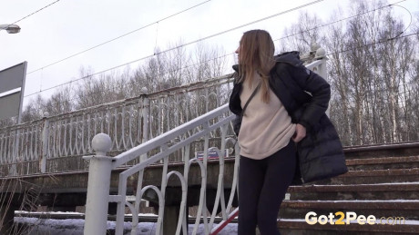 Caucasian female Valya takes a piss on snow-covered steps in public - #251145