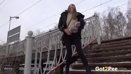 Caucasian female Valya takes a piss on snow-covered steps in public - #251157