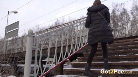 Caucasian female Valya takes a piss on snow-covered steps in public - #251158