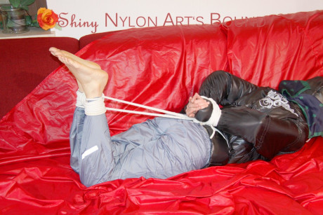 Sonja tied and gagged with ropes and a ball gag wearing a lovely grey shiny - #13831