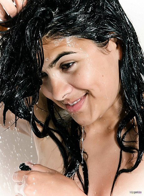 Naked and wet Desi girl woman covers up her boobies while taking a shower - Image 4 of 16  in Babe category   featuring Desi 