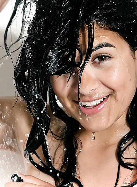 Naked and wet Desi girl woman covers up her boobies while taking a shower - Image 5 of 16  in Babe category   featuring Desi 