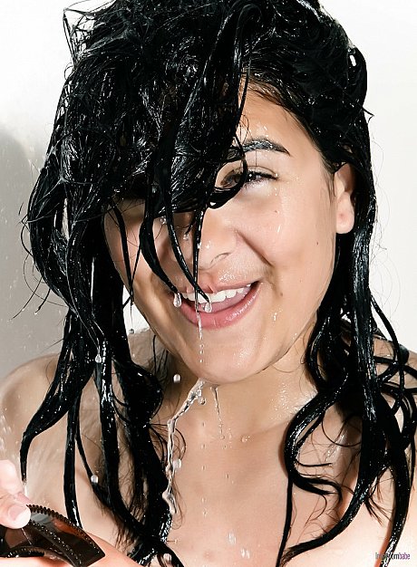 Naked and wet Desi girl woman covers up her boobies while taking a shower - Image 6 of 16  in Babe category   featuring Desi 