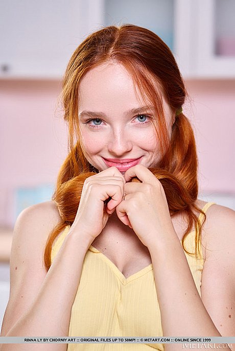 Fresh young ginger Rinna Ly holds her pigtails while getting undressed in a cuisine - Image 3 of 18  in Model category   featuring Rinna Ly 