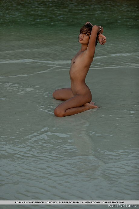 Skinny Thai teen Rosah gets totally naked while at the beach