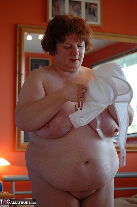 Meaty amateur uncups her enormous titties as she steps inside to change clothes - Image 10 of 20  in Amateur category   featuring Chris44g 