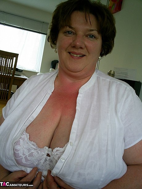 Meaty amateur uncups her enormous titties as she steps inside to change clothes - Image 20 of 20  in Amateur category   featuring Chris44g 