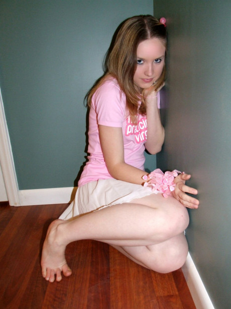 Short sweetie Kitty slowly gets rid of her clothes and poses undressed on the floor - #1351417