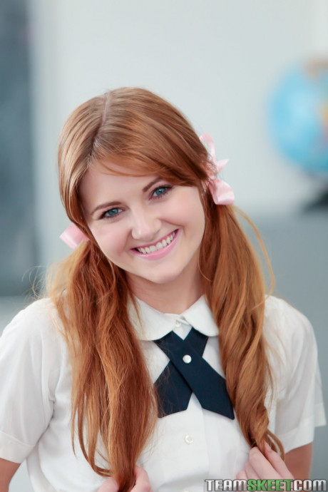 Pigtailed redhead student Miley Cole undresses to play nude on teacher's desk