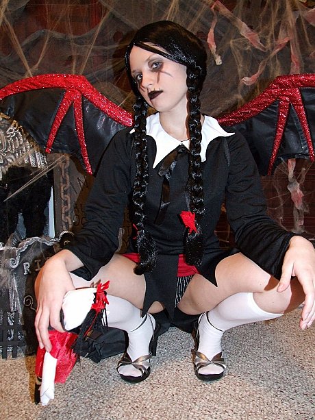 Pigtailed chinese MILF Kitty strips to pose naked in a horror cosplay solo - Image 1 of 21  in Pussy category   featuring Kitty 