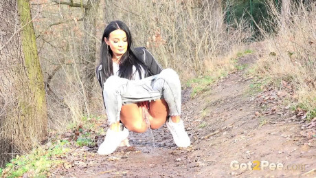 Maddi black squats on a dirt track path to pee - #371862