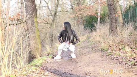Maddi black squats on a dirt track path to pee - #371864