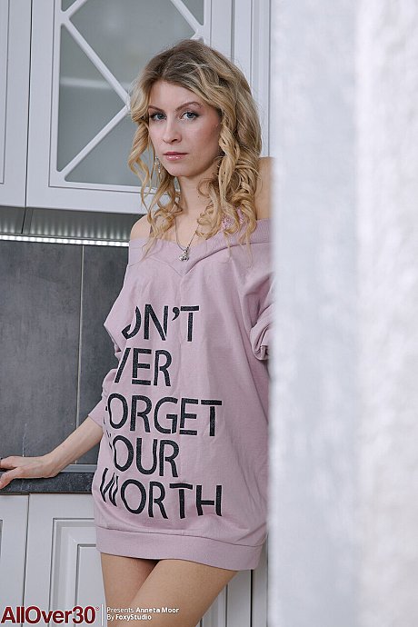 Over 30 blondy Anneta Moor gets naked in a kitchenette before fingering her bush - Image 2 of 16  in Skirt category   featuring Anneta Moor 