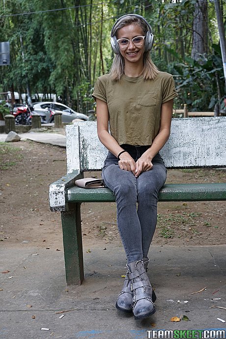 Veronica Leal posing all over her hood in green shirt and tight jeans - Image 1 of 16  in Outdoor category   featuring Veronica Leal 