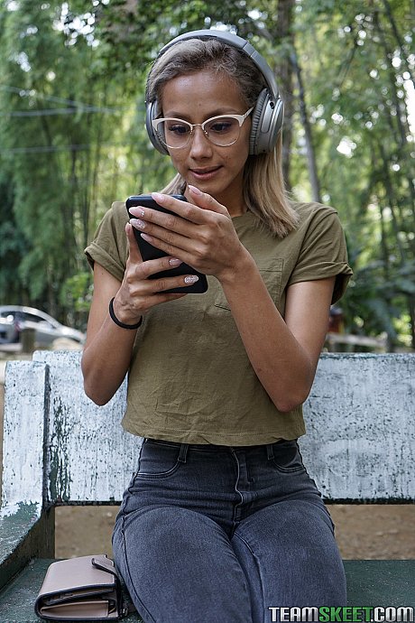 Veronica Leal posing all over her hood in green shirt and tight jeans - Image 2 of 16  in Outdoor category   featuring Veronica Leal 