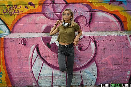 Veronica Leal posing all over her hood in green shirt and tight jeans - Image 5 of 16  in Outdoor category   featuring Veronica Leal 