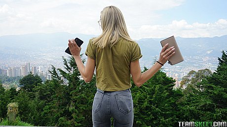 Veronica Leal posing all over her hood in green shirt and tight jeans - Image 16 of 16  in Outdoor category   featuring Veronica Leal 