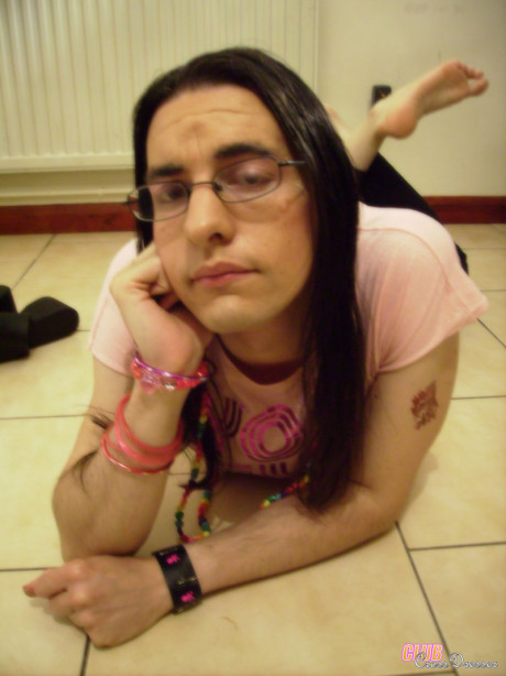 This crossdresser enjoys to put on her sweet pink outfits for the camera - #692274